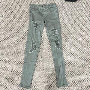 American Eagle green distressed jeggings, women’s size 00